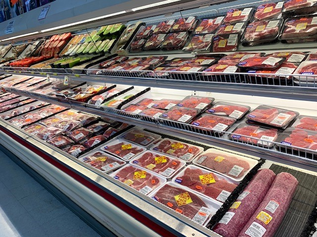 image of frozen meats in grocery store